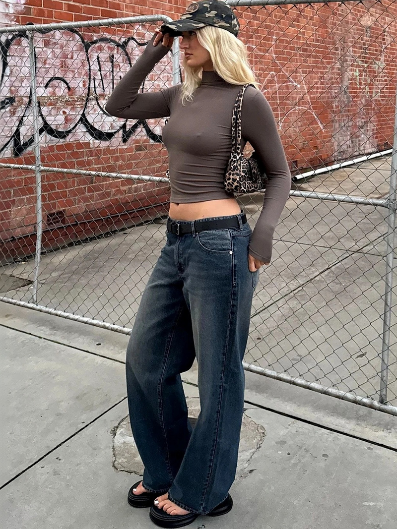 Women's brown loose high-rise stretchable straight fit jeans.