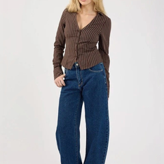 Women's dark blue high-rise loose wide leg stretchable jeans.