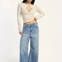 Women's light blue loose high-rise stretchable flared jeans.