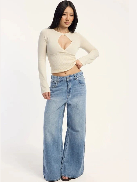 Women's light blue loose high-rise stretchable flared jeans.