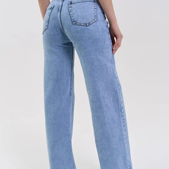 Women's light blue wide leg high-rise stretchable jeans with light fade and pleated detailing.