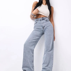 Women's light blue wide leg high-rise stretchable jeans with light fade detailing.