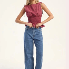 Women's light blue super wide leg high-rise stretchable jeans.
