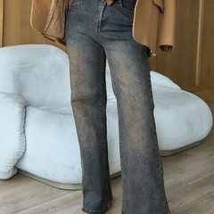 Women's brown high-rise straight fit stretchable jeans with heavy fade detailing.