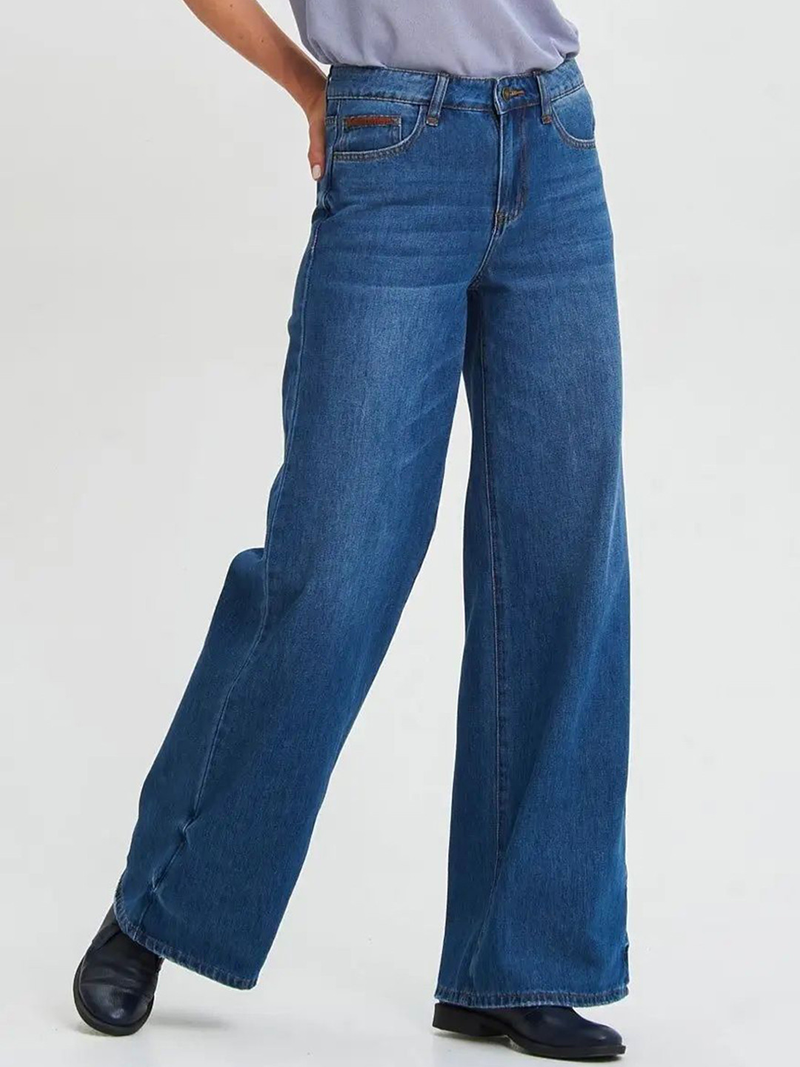 Women's dark blue relaxed fit high-rise stretchable jeans with low distress and light fade detailing.