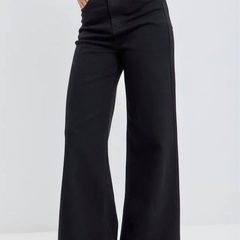 Women's black wide leg high-rise stretchable jeans.