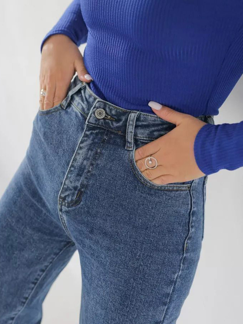 Women's light blue wide leg high-rise stretchable jeans.