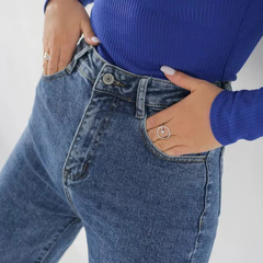Women's light blue wide leg high-rise stretchable jeans.