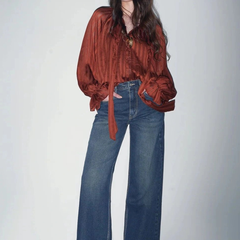 Women's green wide leg high-rise stretchable jeans.