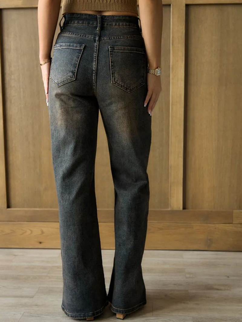 Women's brown high-rise straight fit stretchable jeans with heavy fade detailing.