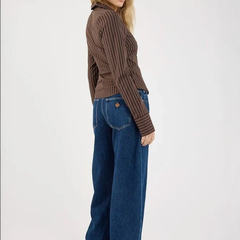 Women's dark blue high-rise loose wide leg stretchable jeans.
