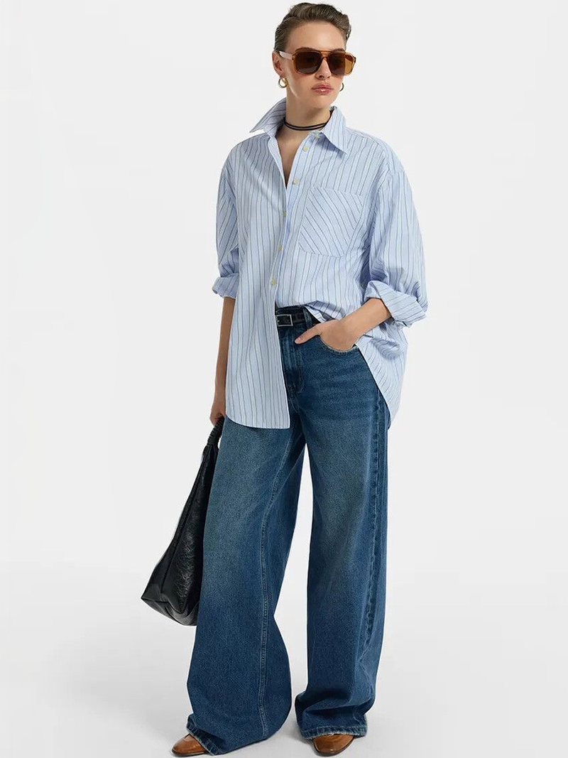 Women's blue high-rise stretchable jeans with light fade