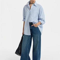Women's blue high-rise stretchable jeans with light fade