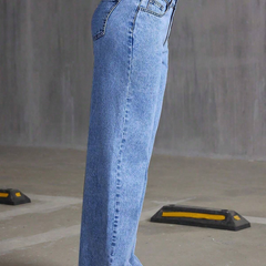 Women's light blue baggy high-rise stretchable jeans.