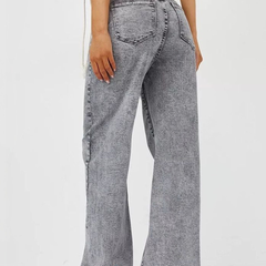 Women's grey high-rise stretchable jeans with heavy fade detailing.