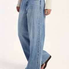 Women's light blue loose high-rise stretchable flared jeans.