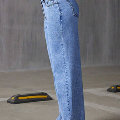 Women's light blue baggy high-rise stretchable jeans.