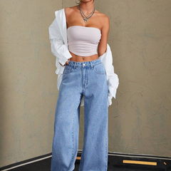 Women's blue mid-rise stretchable wide leg jeans with slash knee detailing.