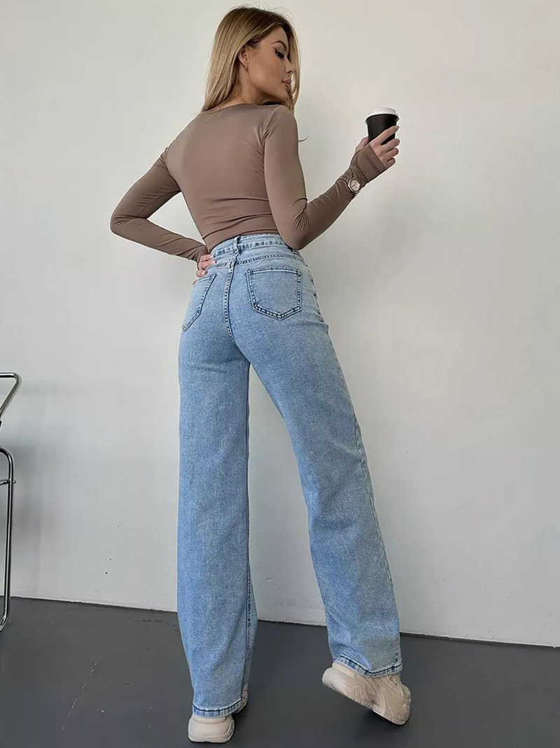 Women's straight fit high-rise highly distressed stretchable jeans.