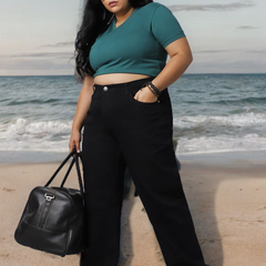 Women's black relaxed fit high-rise stretchable jeans with mildly distressed detailing.