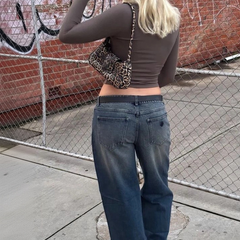 Women's brown loose high-rise stretchable straight fit jeans.