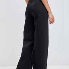 Women's black wide leg high-rise stretchable jeans.