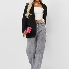 Women's grey high-rise stretchable jeans with heavy fade detailing.