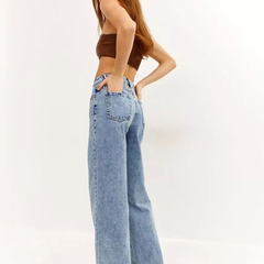 Women’s light blue regular fit high-rise stretchable jeans with light fade detailing.