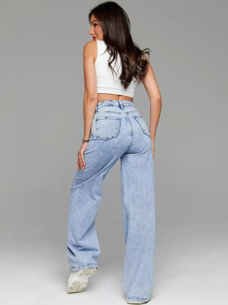Women's light blue wide leg high-rise stretchable jeans with light fade detailing.