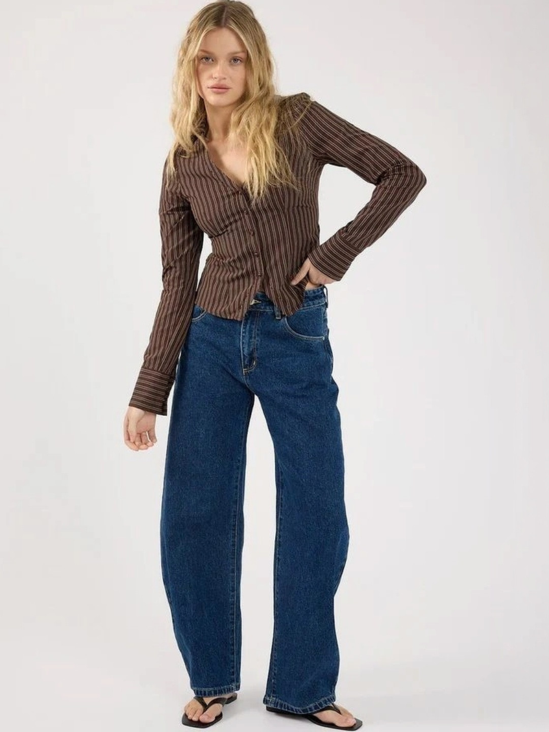 Women's dark blue high-rise loose wide leg stretchable jeans.