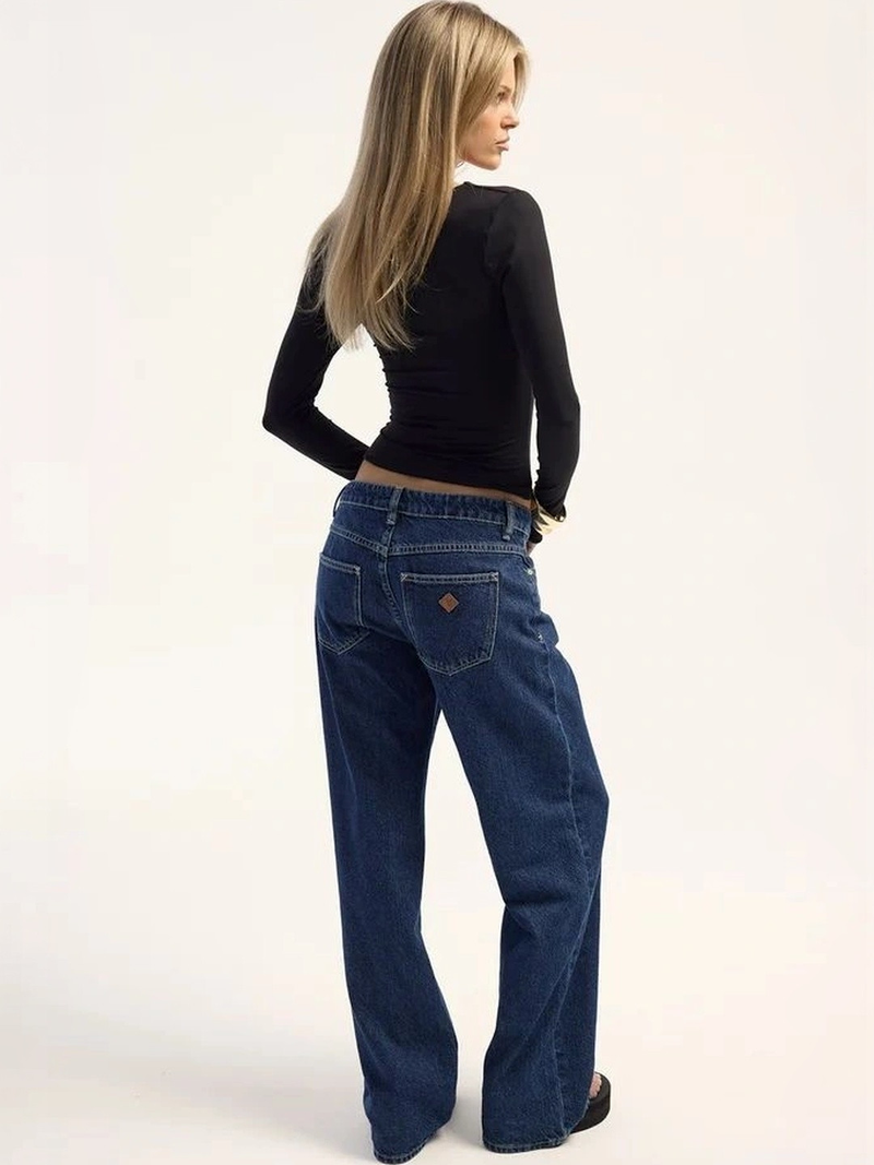 Women's dark blue wide leg high-rise stretchable jeans.