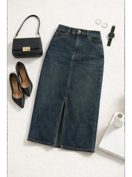Women’s blue denim midi skirt with high-rise fit and back pocket design, styled with a white strapless top.