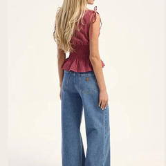 Women's light blue super wide leg high-rise stretchable jeans.