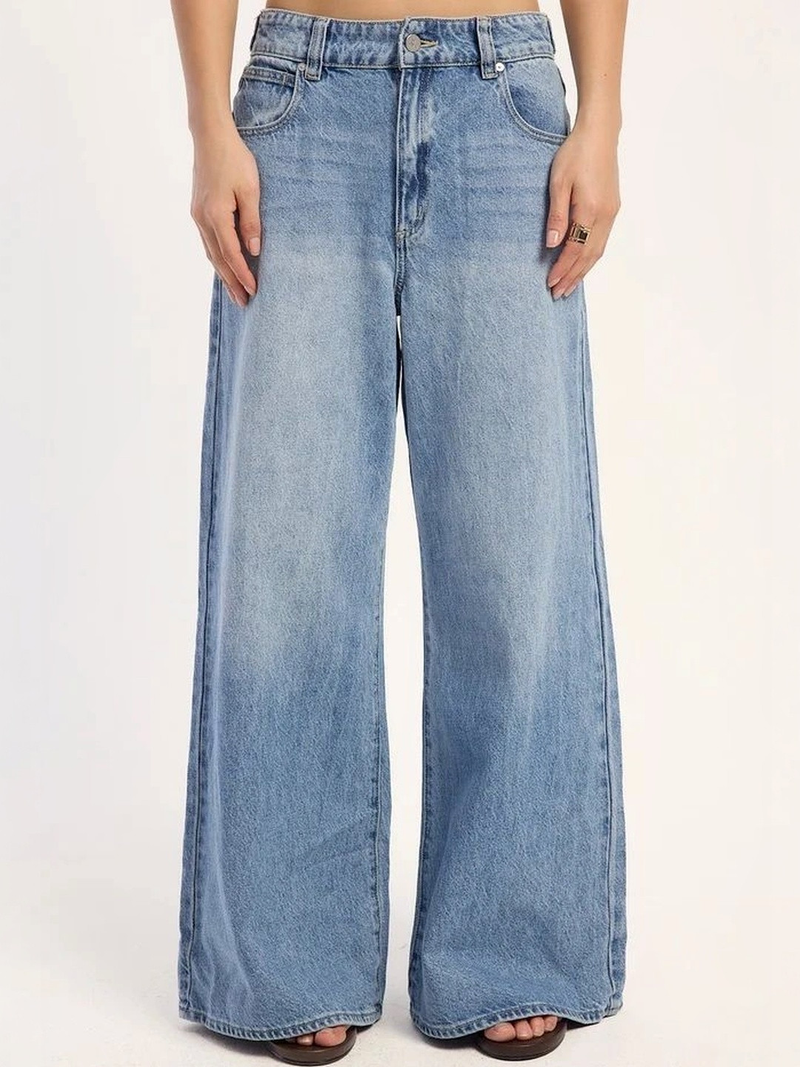 Women's light blue loose high-rise stretchable flared jeans.