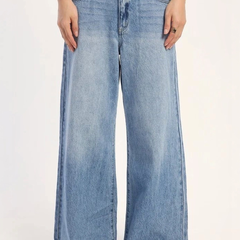 Women's light blue loose high-rise stretchable flared jeans.