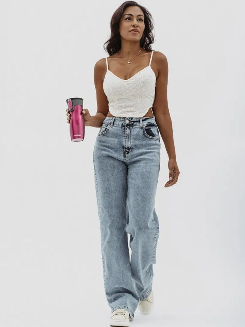 Women's light blue wide leg high-rise stretchable jeans with light fade detailing.