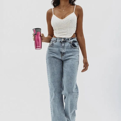 Women's light blue wide leg high-rise stretchable jeans with light fade detailing.