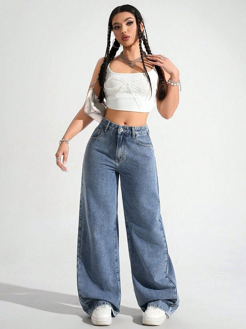 Women's blue high-rise stretchable jeans with light fade details