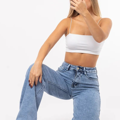 Women's light blue wide leg high-rise stretchable jeans with light fade and pleated detailing.
