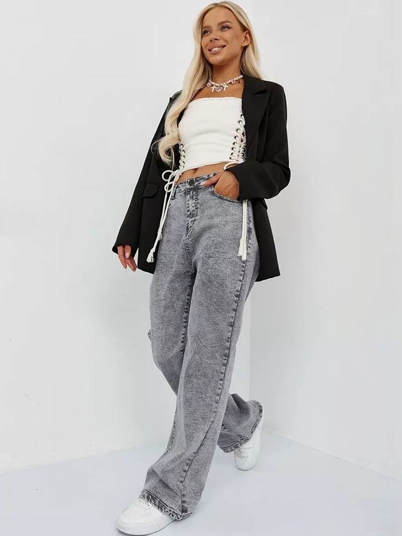 Women's grey high-rise stretchable jeans with heavy fade detailing.