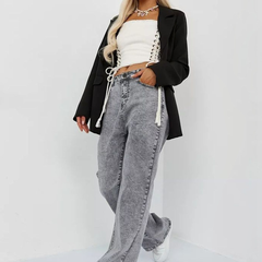 Women's grey high-rise stretchable jeans with heavy fade detailing.