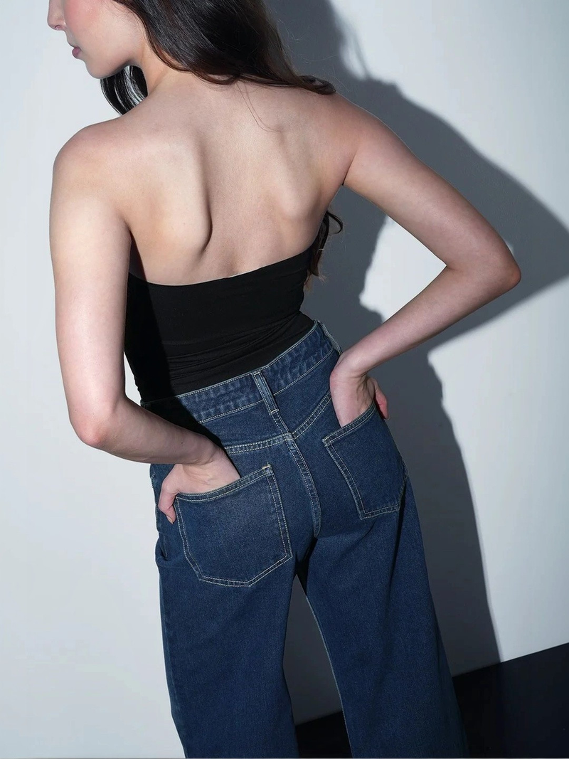 Women's green wide leg high-rise stretchable jeans.