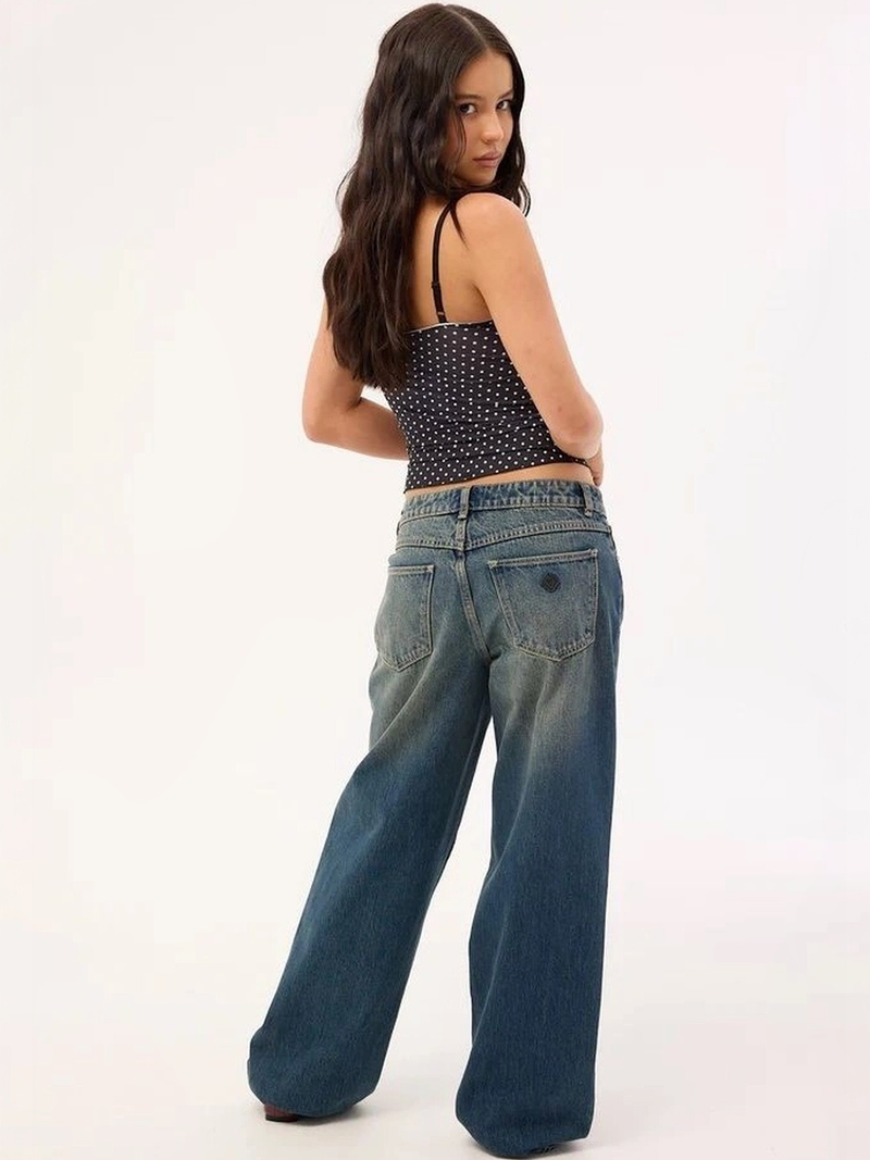 Women's brown loose high-rise stretchable straight fit jeans.