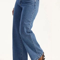 Women's light blue super wide leg high-rise stretchable jeans.