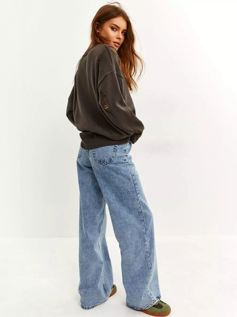 Women’s light blue regular fit high-rise stretchable jeans with light fade detailing.