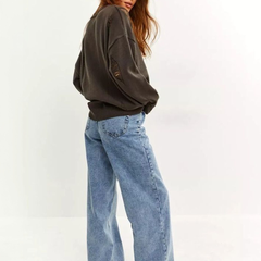 Women’s light blue regular fit high-rise stretchable jeans with light fade detailing.