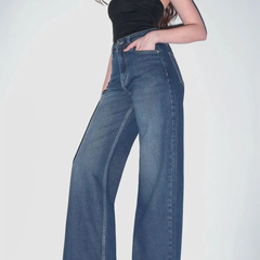 Women's green wide leg high-rise stretchable jeans.