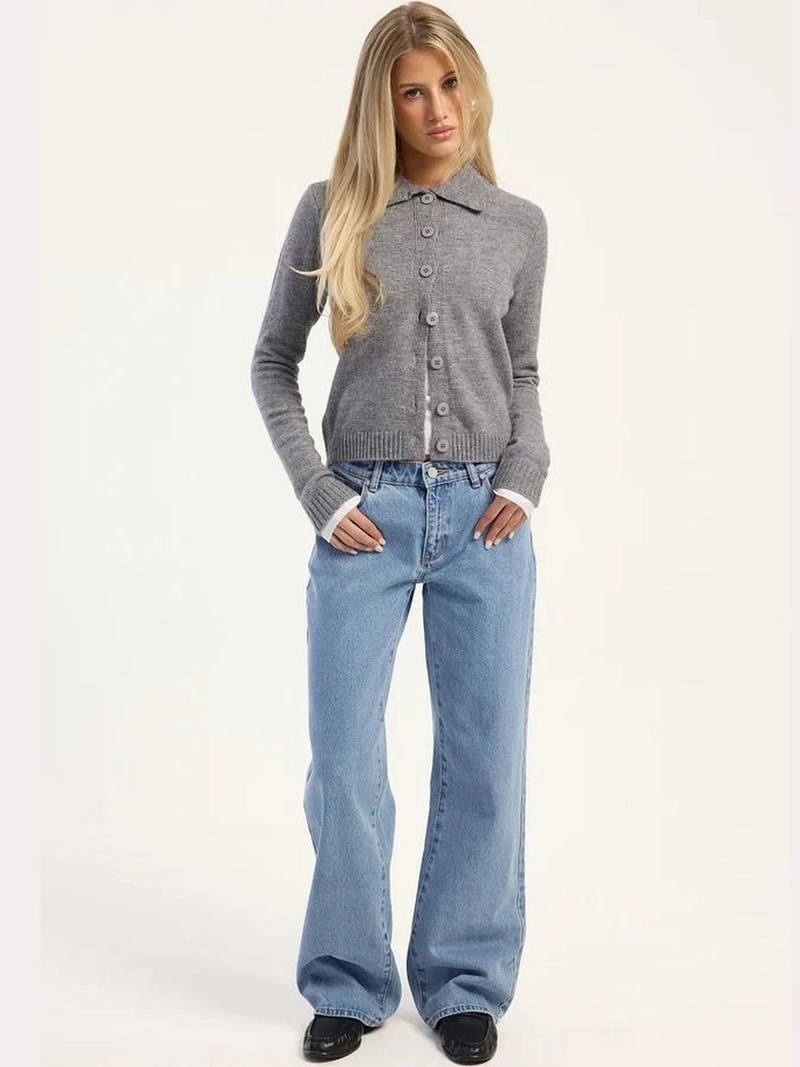 Women's light blue high-rise loose wide leg stretchable jeans.