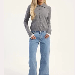 Women's light blue high-rise loose wide leg stretchable jeans.