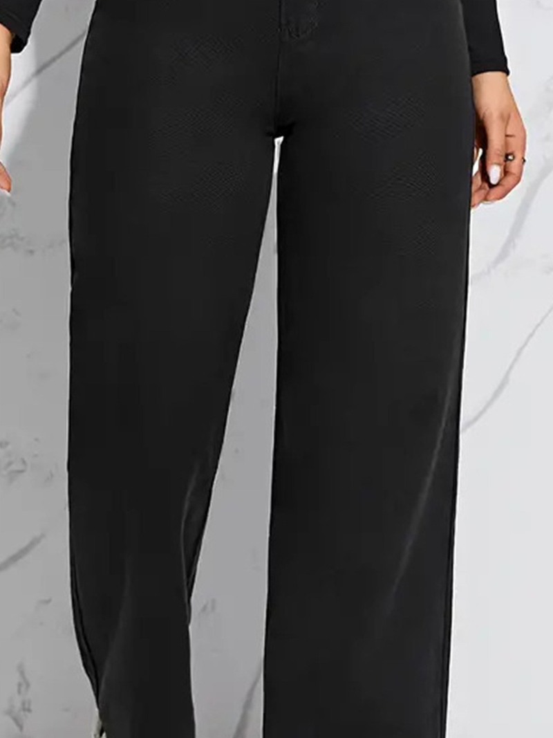 Women's black straight fit high-rise stretchable jeans.